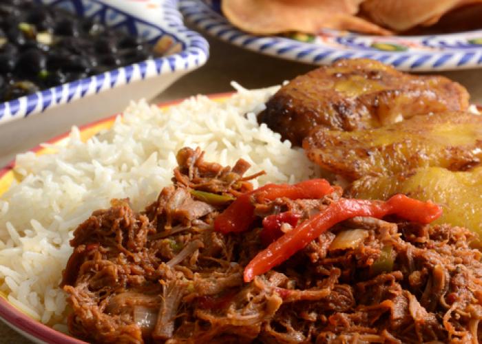 carribean food on colorful plates